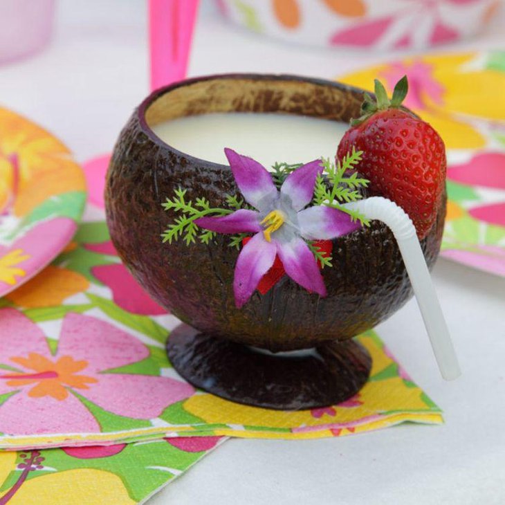 Fun coconut cup decor for summer birthday tables