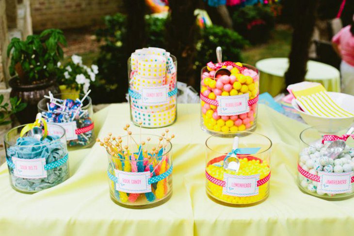 Neon accented candy decor on summer birthday table
