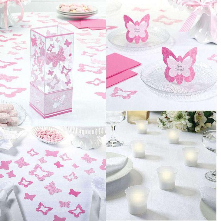 Pink and white butterfly decor on summer birthday table