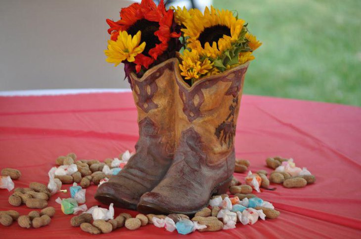 Summary boots with flowers birthday table centerpiece